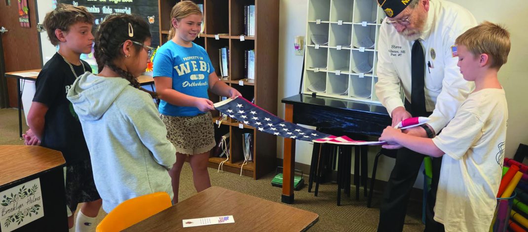 Flag-Folding Demonstration Hosted at IELS